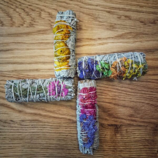 Elevate your space with floral sage smudging sticks. Burn to neutralize negative energy, improve sleep, & deepen your spiritual connection.
