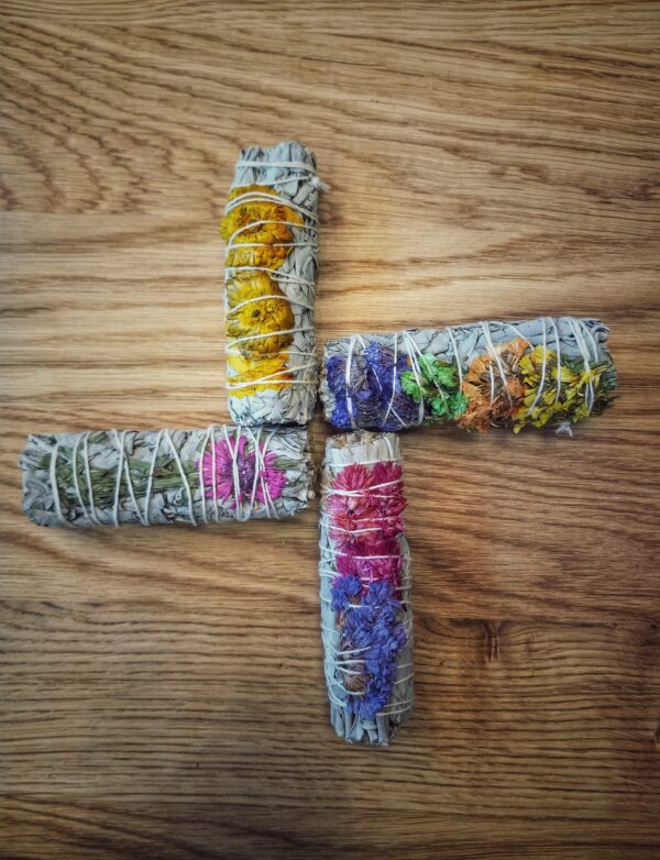 Elevate your space with floral sage smudging sticks. Burn to neutralize negative energy, improve sleep, & deepen your spiritual connection.