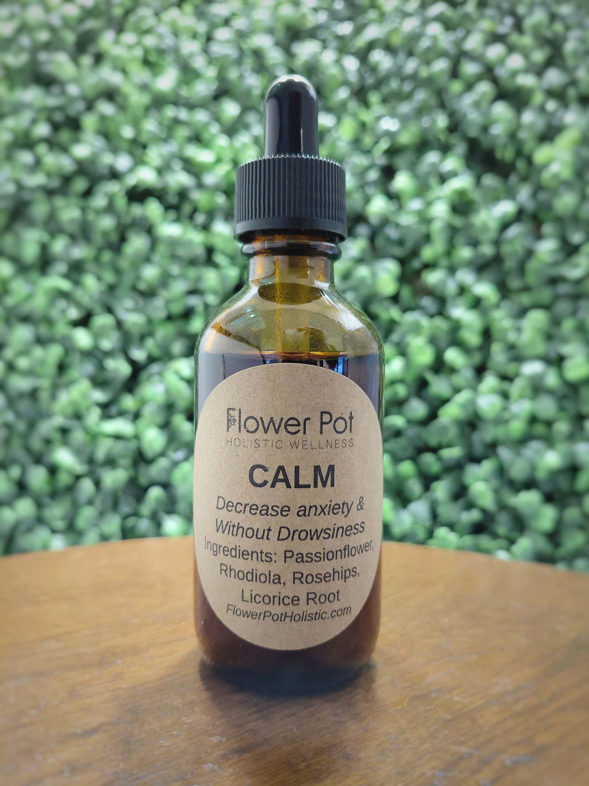 Dropper bottle of holistic wellness tincture with ingredients like passionflower, rhodiola, rosehips, and licorice root for decreasing anxiety and stress naturally.